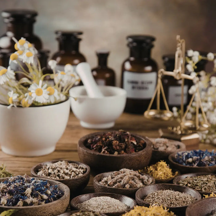Homeopathic remedies arranged in a calm natural wellness setting for an NZ guide article