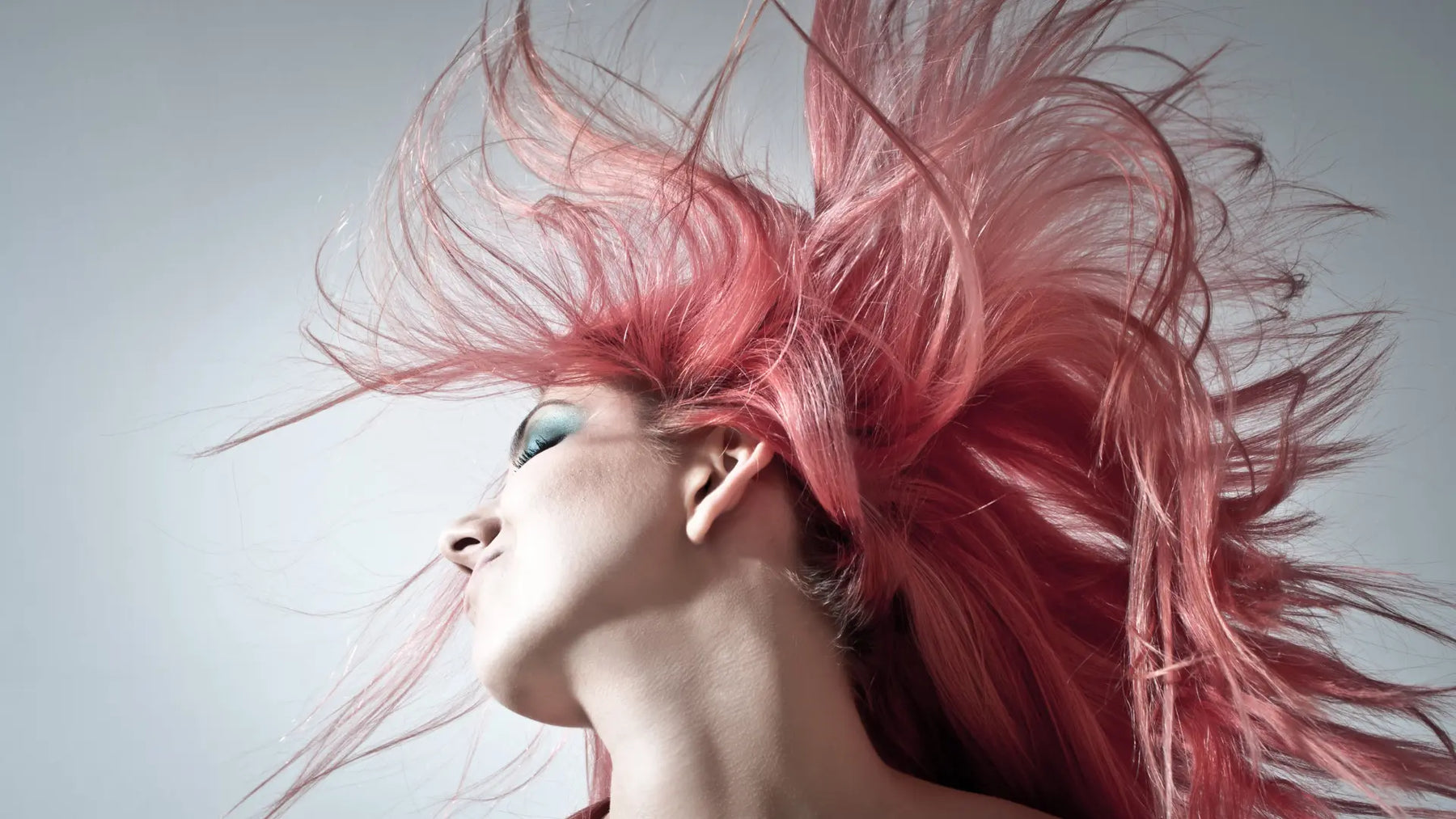 Botanical natural hair dye products with henna, herbal powders and brown, blonde, auburn and mahogany hair colour swatches.
