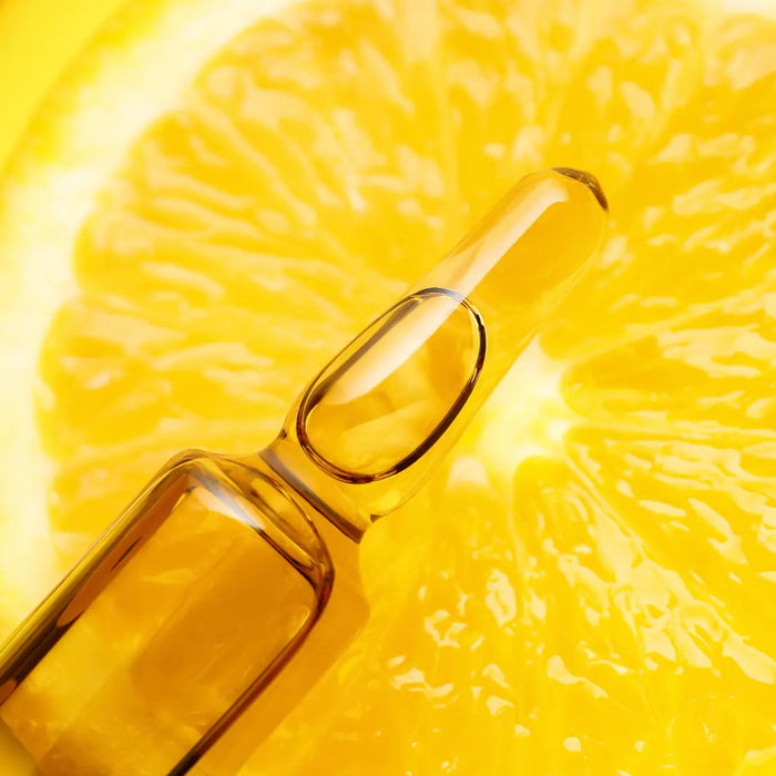 Vitamin C capsules, sachets and powder on a clean desk for a liposomal vitamin C NZ comparison guide