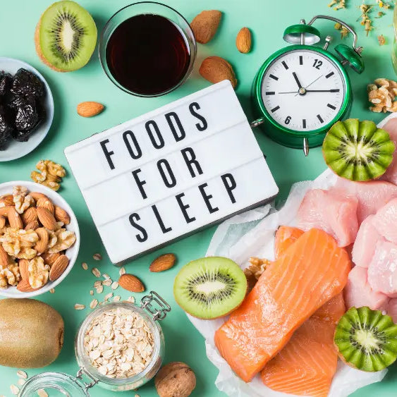 Overhead arrangement of protein-rich foods, pumpkin seeds, botanical leaves and unbranded supplement capsules illustrating the difference between L-tryptophan and 5-HTP.