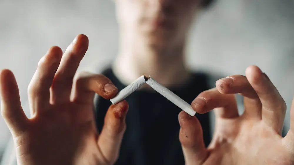 Two adults after dinner considering nicotine withdrawal and learned smoking triggers