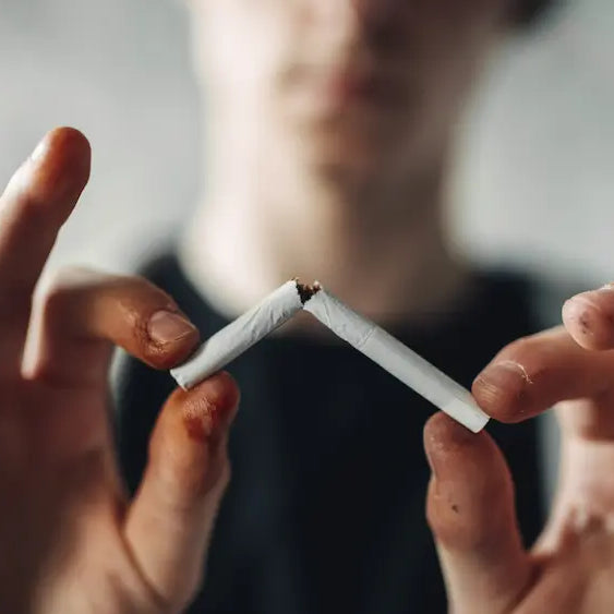 Two adults after dinner considering nicotine withdrawal and learned smoking triggers