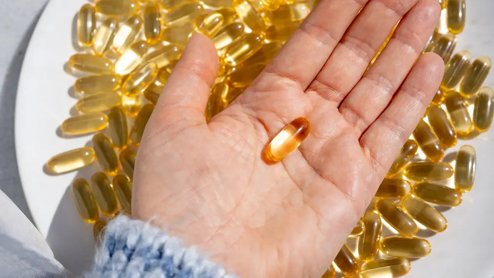 Vitamin D supplement beside a meal in a bright New Zealand kitchen