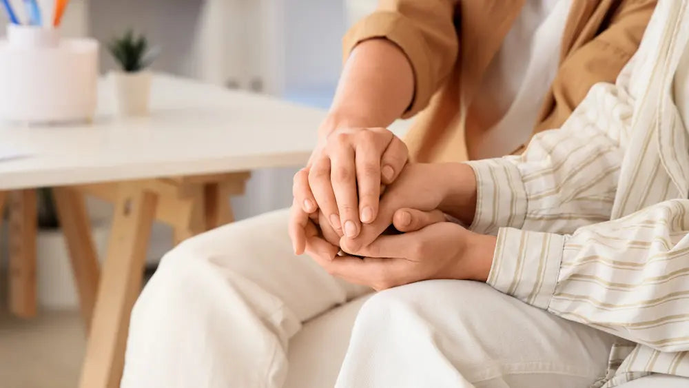 Woman over 35 planning preconception supplements with her partner in a calm New Zealand home