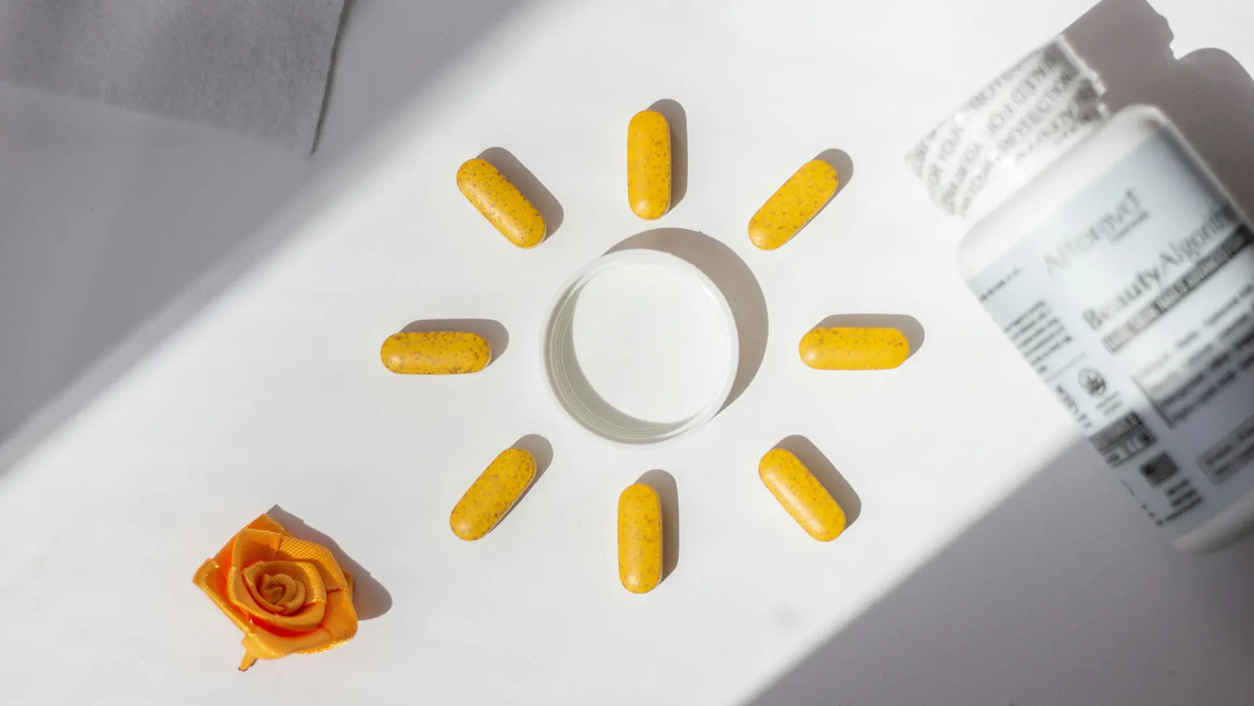At-home vitamin D screening kit, colour band card, ten-minute timer and result notebook on a clean table