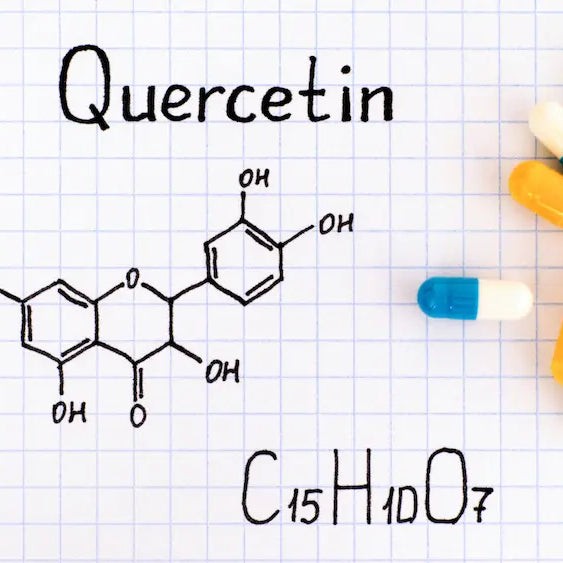 Two quercetin with bromelain supplement bottles being compared on a table, illustrating different capsule directions and daily serving amounts in NZ.