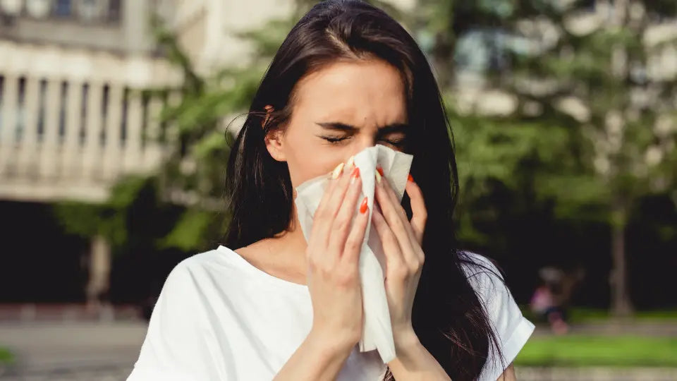 Seasonal allergy cupboard audit with quercetin, vitamin C, allergy blend, saline spray and a separate antihistamine packet