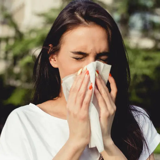 Seasonal allergy cupboard audit with quercetin, vitamin C, allergy blend, saline spray and a separate antihistamine packet