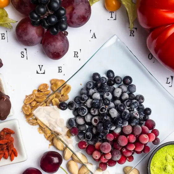 Trans resveratrol vs resveratrol concept with supplement bottles and molecular shape illustration