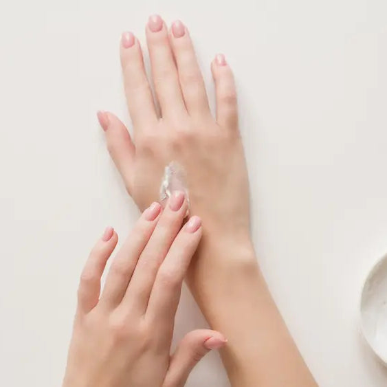 Intact hands or feet in a warm New Zealand winter home with topical cream nearby