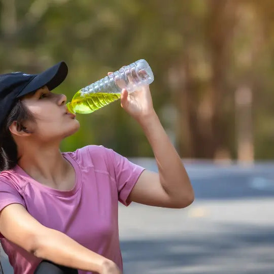 New Zealand hydration decision scene with plain water, electrolyte powder and liquid concentrate, and separate oral rehydration sachets